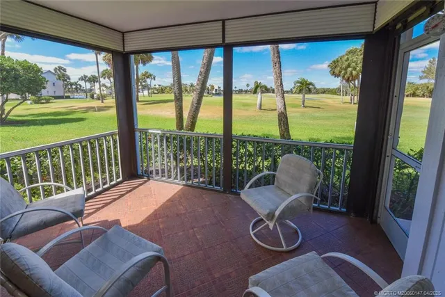 a view of a park with palm trees