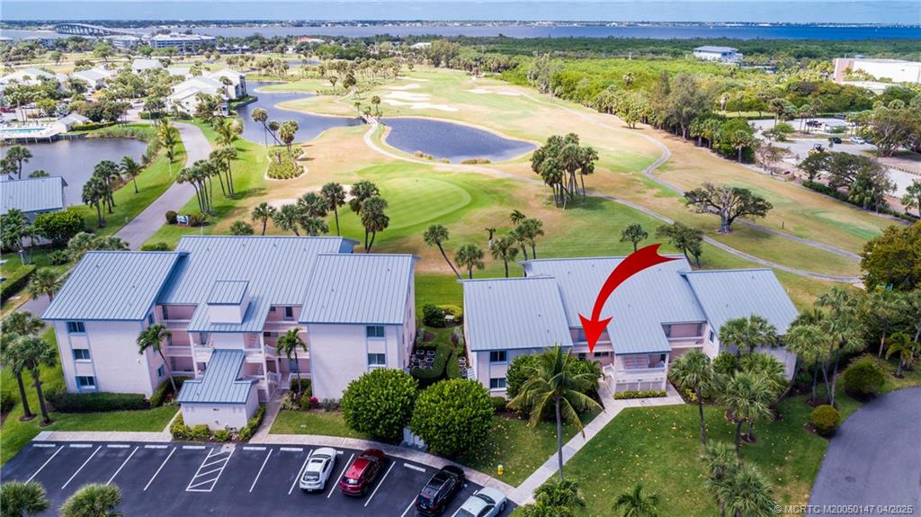5811 Northeast Gulfstream Way, Unit 4002 Stuart, FL 34996 - Photo 3 of 39 an aerial view of residential house with outdoor space and pool