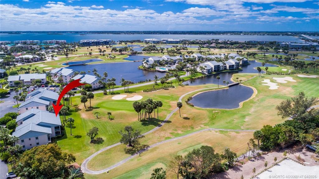 5811 Northeast Gulfstream Way, Unit 4002 Stuart, FL 34996 - Photo 36 of 39 an aerial view of residential house with outdoor space