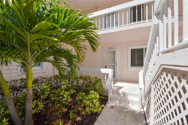 a hallway with furniture and a window