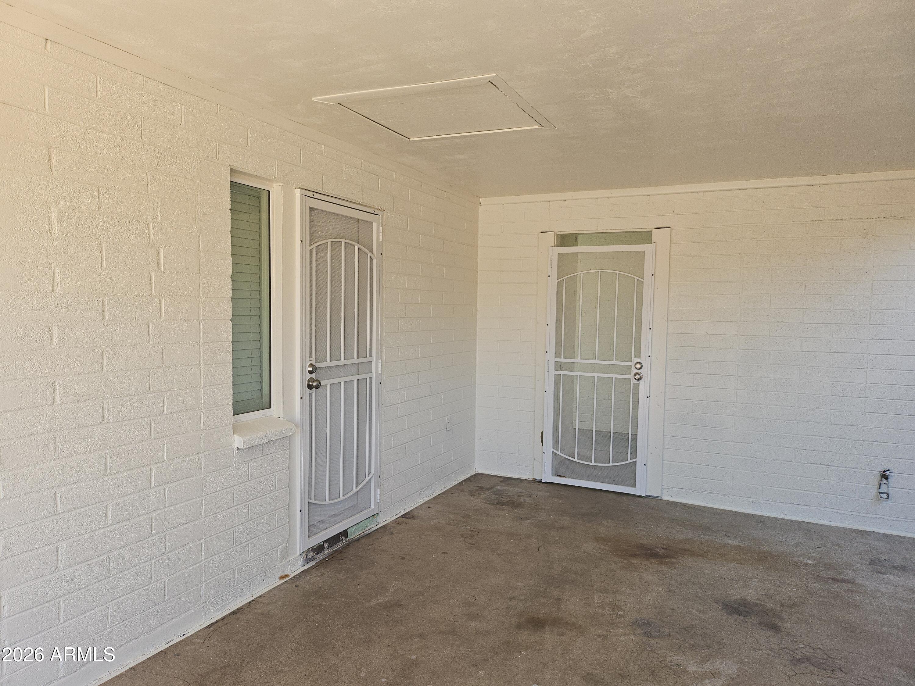 524 West 3rd Place Mesa, AZ 85201 - Photo 2 of 23 an empty room with windows