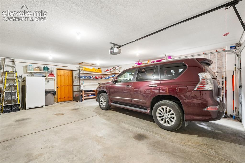 858 Oak Ridge Road Manitou Springs, CO 80829 - Photo 49 of 50 2 car oversized garage with workbench