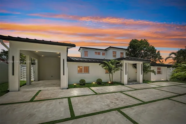 a view of a house with a garden
