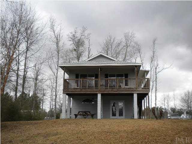 6510 River Bend Road Molino, FL 32577 - Photo 2 of 24 Excellent elevation! On the bluffs of Escambia River.