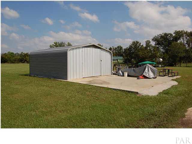 6510 River Bend Road Molino, FL 32577 - Photo 3 of 24 Nice "tractor shed", as you come down the long drive to a breath taking paradise.