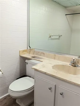 a view of a balcony with wooden floor