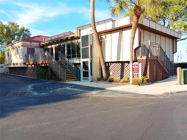 a view of a swimming pool with an ocean view
