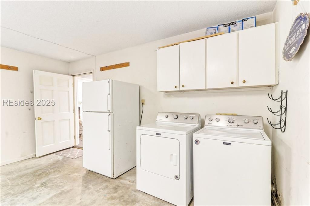 13 Mallard Road Hilton Head Island, SC 29928 - Photo 28 of 44 Laundry space & extra refrigerator found in the ga