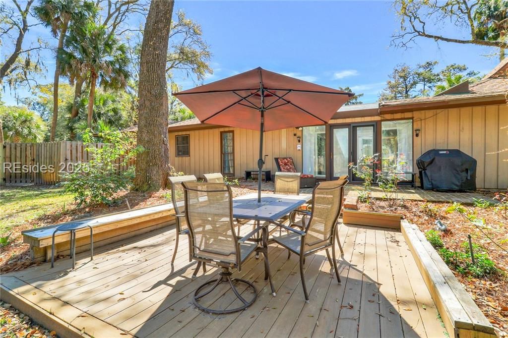 13 Mallard Road Hilton Head Island, SC 29928 - Photo 34 of 44 Sun deck in backyard is surrounded with bench seat