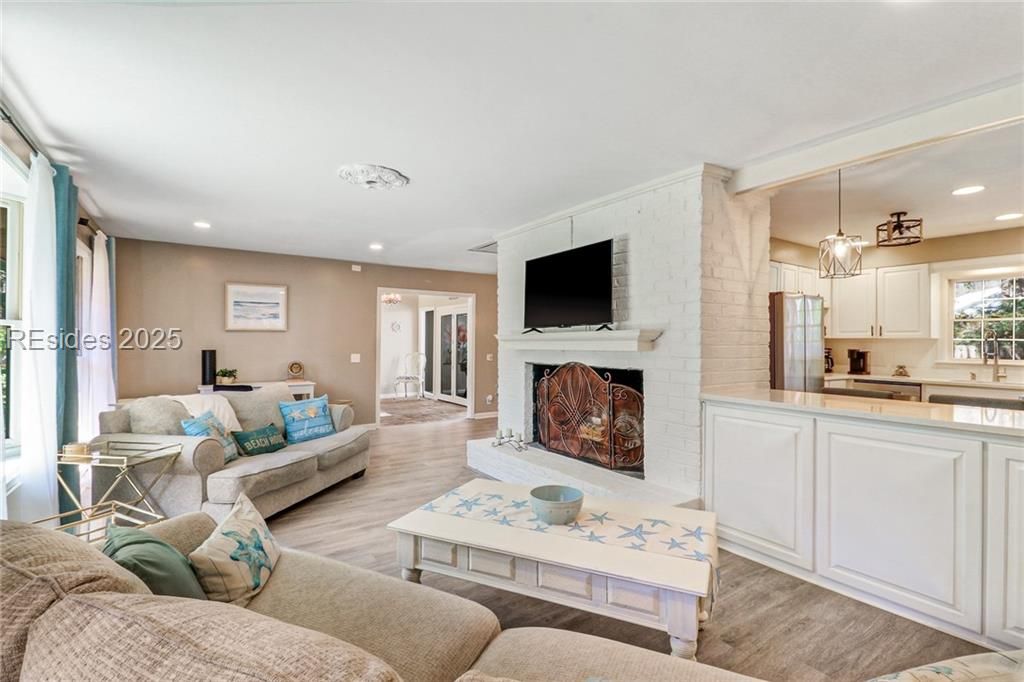 13 Mallard Road Hilton Head Island, SC 29928 - Photo 4 of 44 Breakfast bar pass through keeps the chef a part o