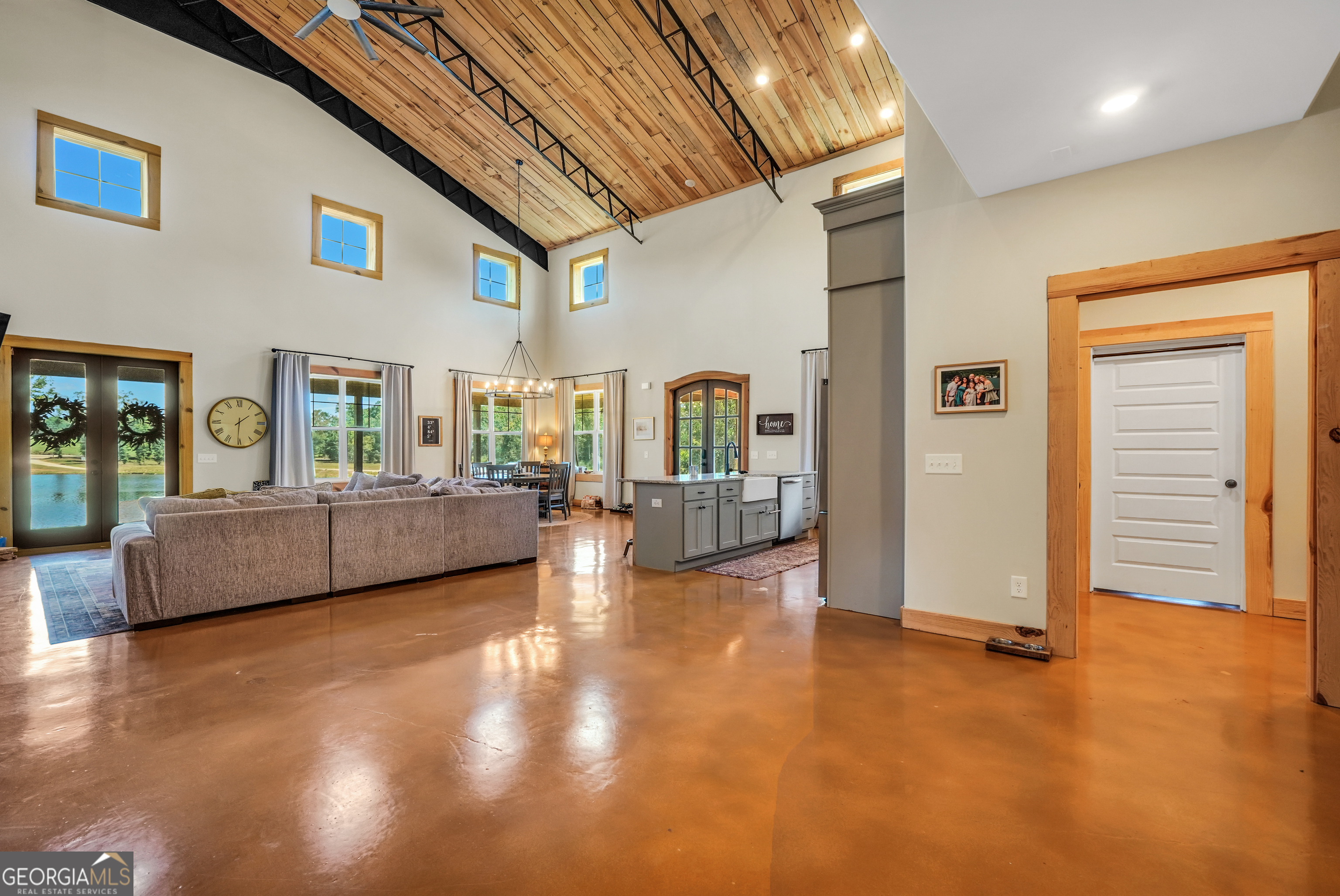 239 Walters Road Barnesville, GA 30204 - Photo 46 of 81 a living room with furniture and a flat screen tv