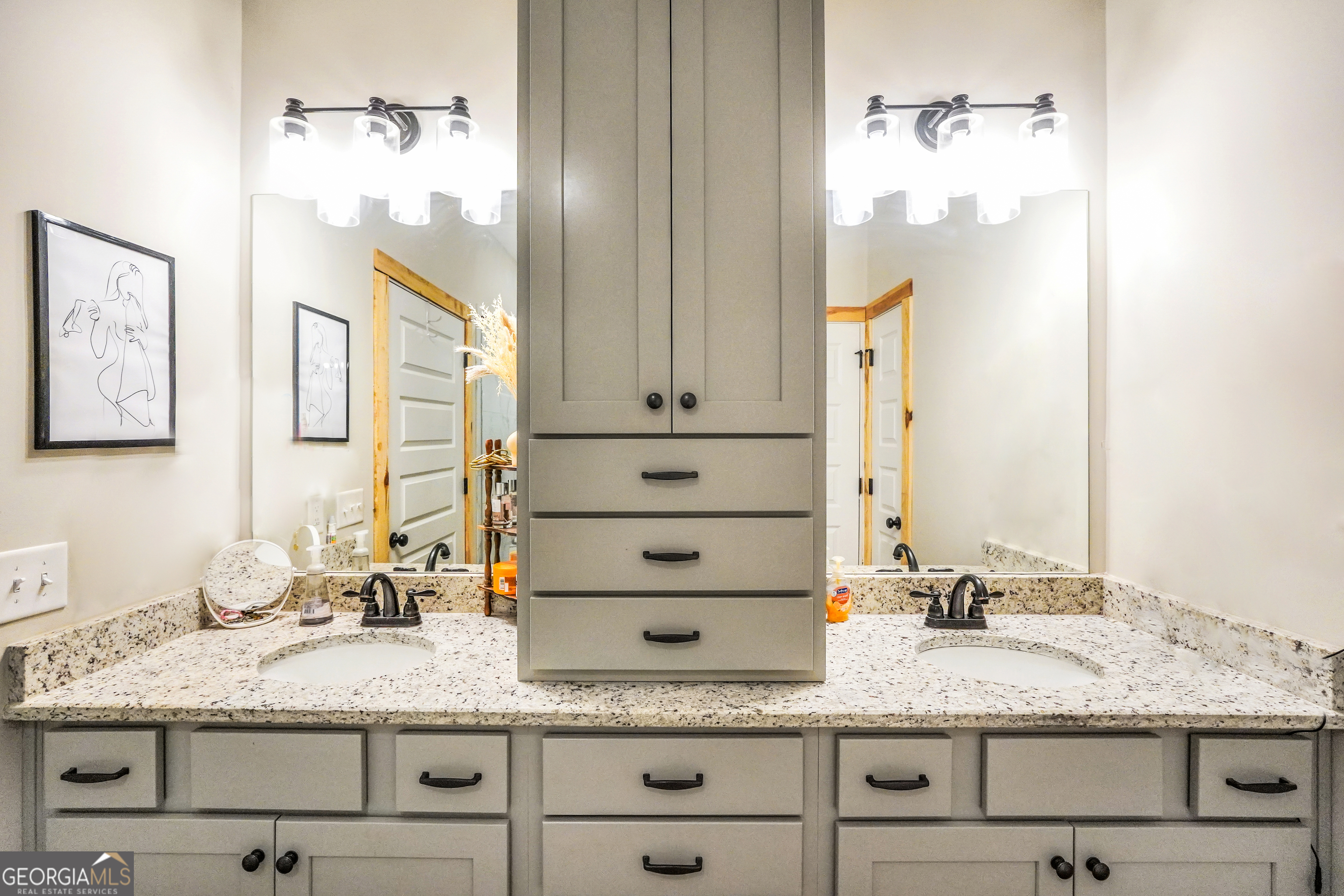 239 Walters Road Barnesville, GA 30204 - Photo 56 of 81 a bathroom with a granite countertop sink and a mirror