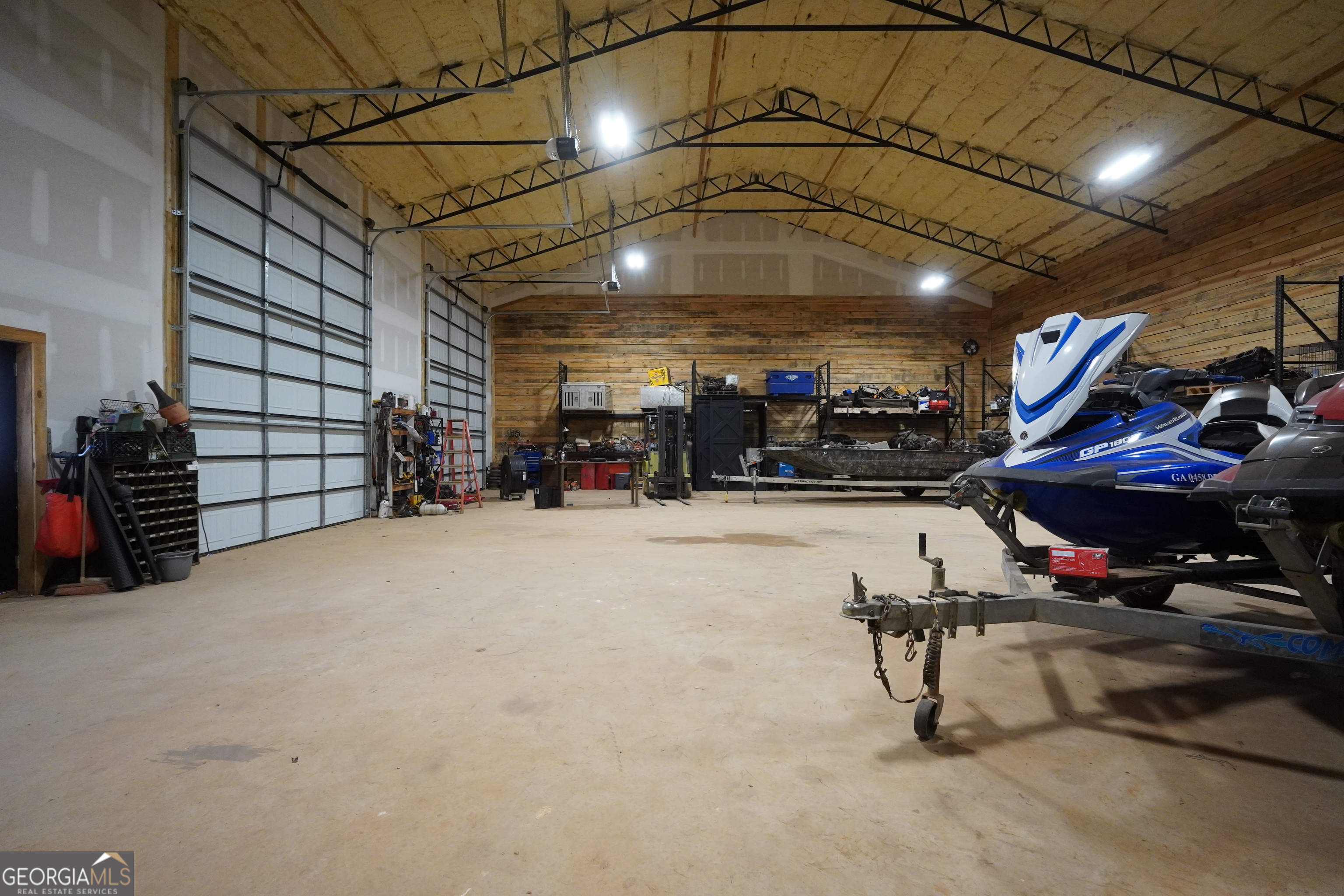239 Walters Road Barnesville, GA 30204 - Photo 66 of 81 a view of a garage with furniture