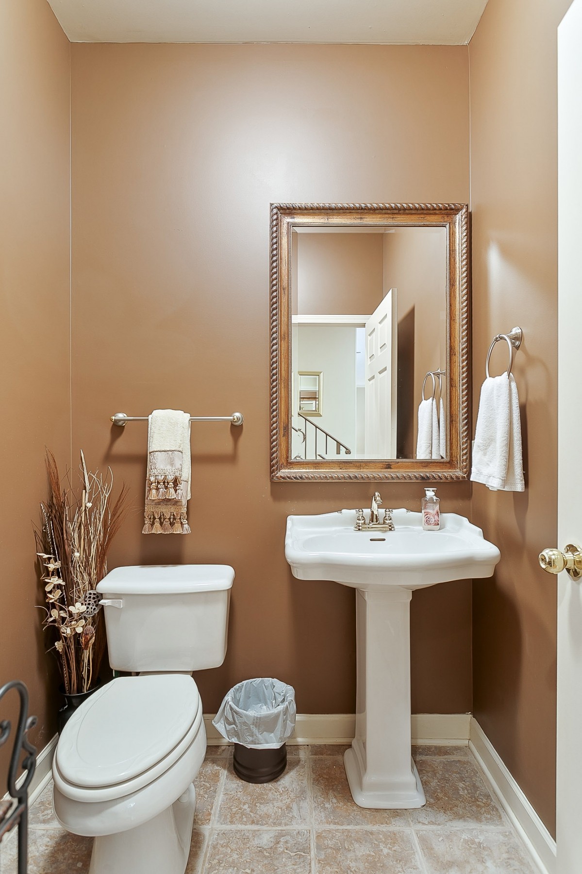 1441 Center Star Road Columbia, TN 38401 - Photo 23 of 62 a bathroom with a toilet a sink and mirror