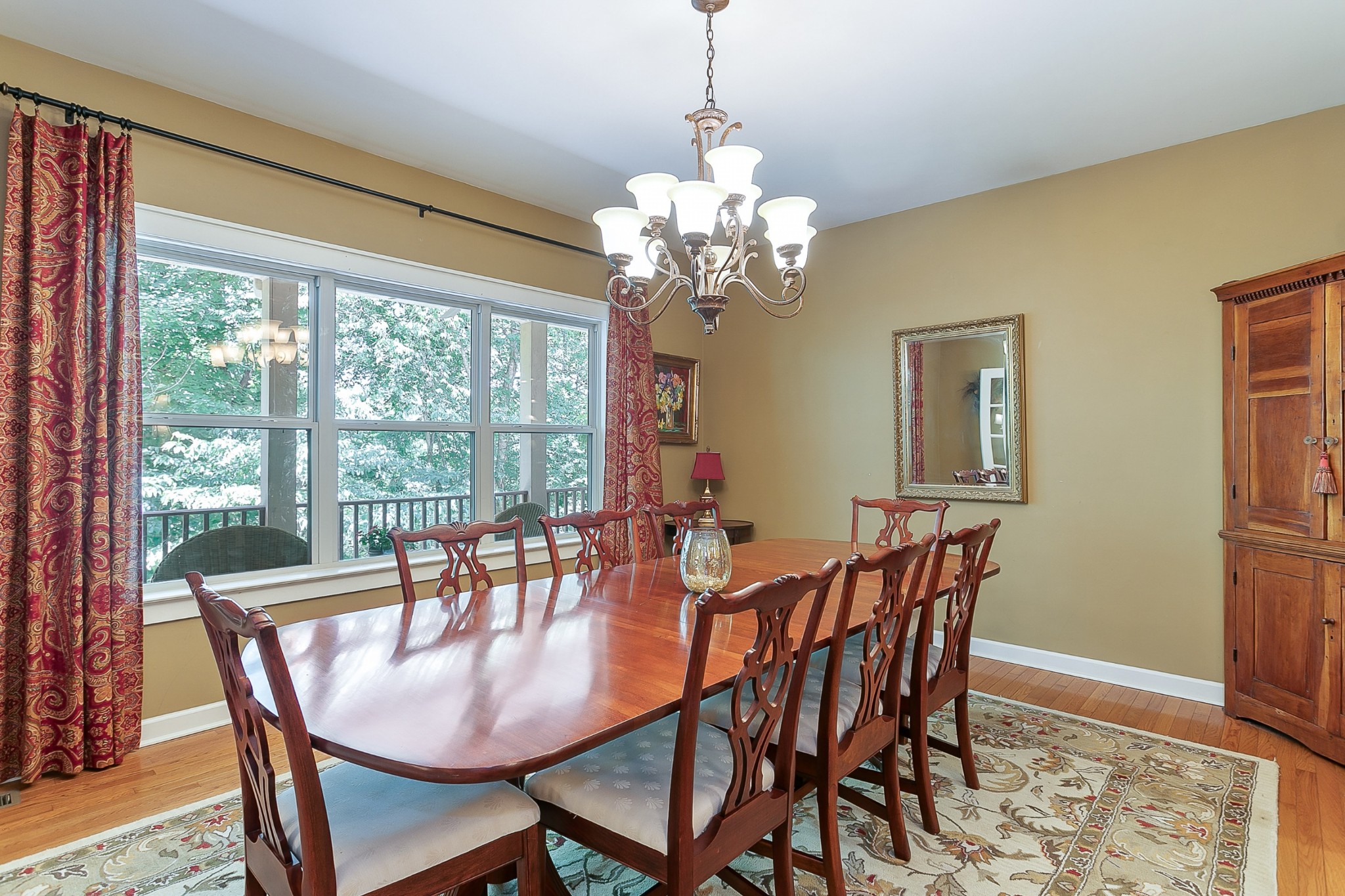 1441 Center Star Road Columbia, TN 38401 - Photo 8 of 62 a dining room with furniture a chandelier and wooden floor