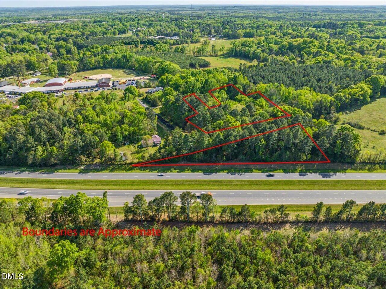 0 Lula Klass Road Goldston, NC 27252 - Photo 5 of 18 a view of an outdoor space with a lake view