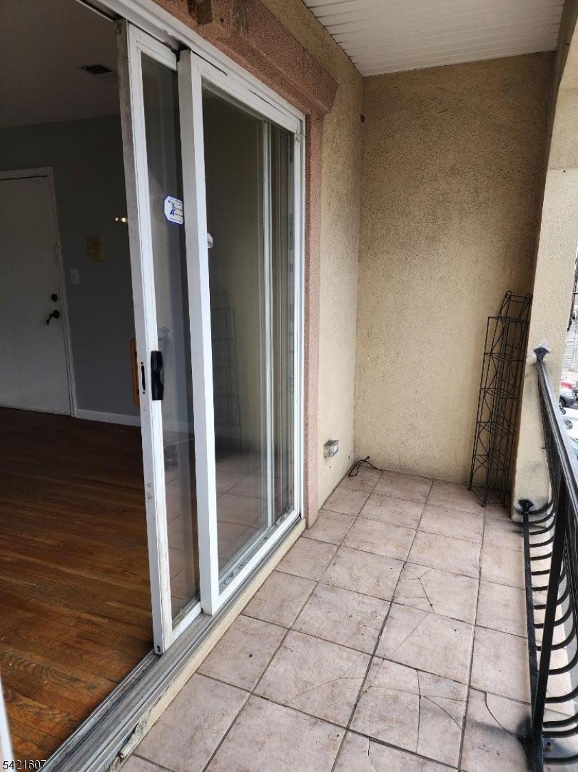 16 5th Street, Unit 2 Elizabeth Port, NJ 07206 - Photo 11 of 14 a view of an empty room and a window
