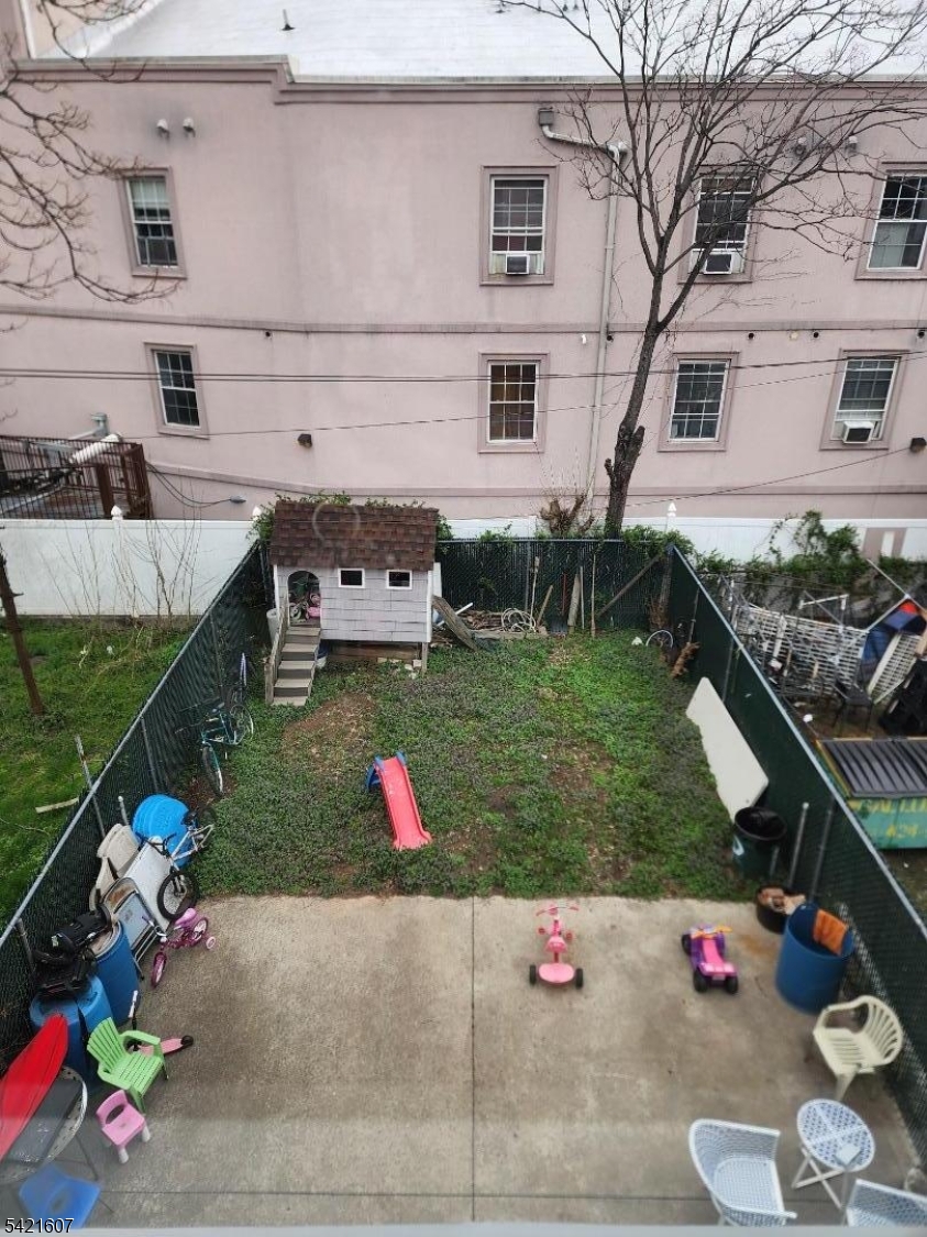 16 5th Street, Unit 2 Elizabeth Port, NJ 07206 - Photo 12 of 14 a view of outdoor space and yard