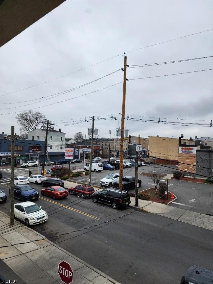 16 5th Street, Unit 2 Elizabeth Port, NJ 07206 - Photo 14 of 14 a city street filled with lots of traffic
