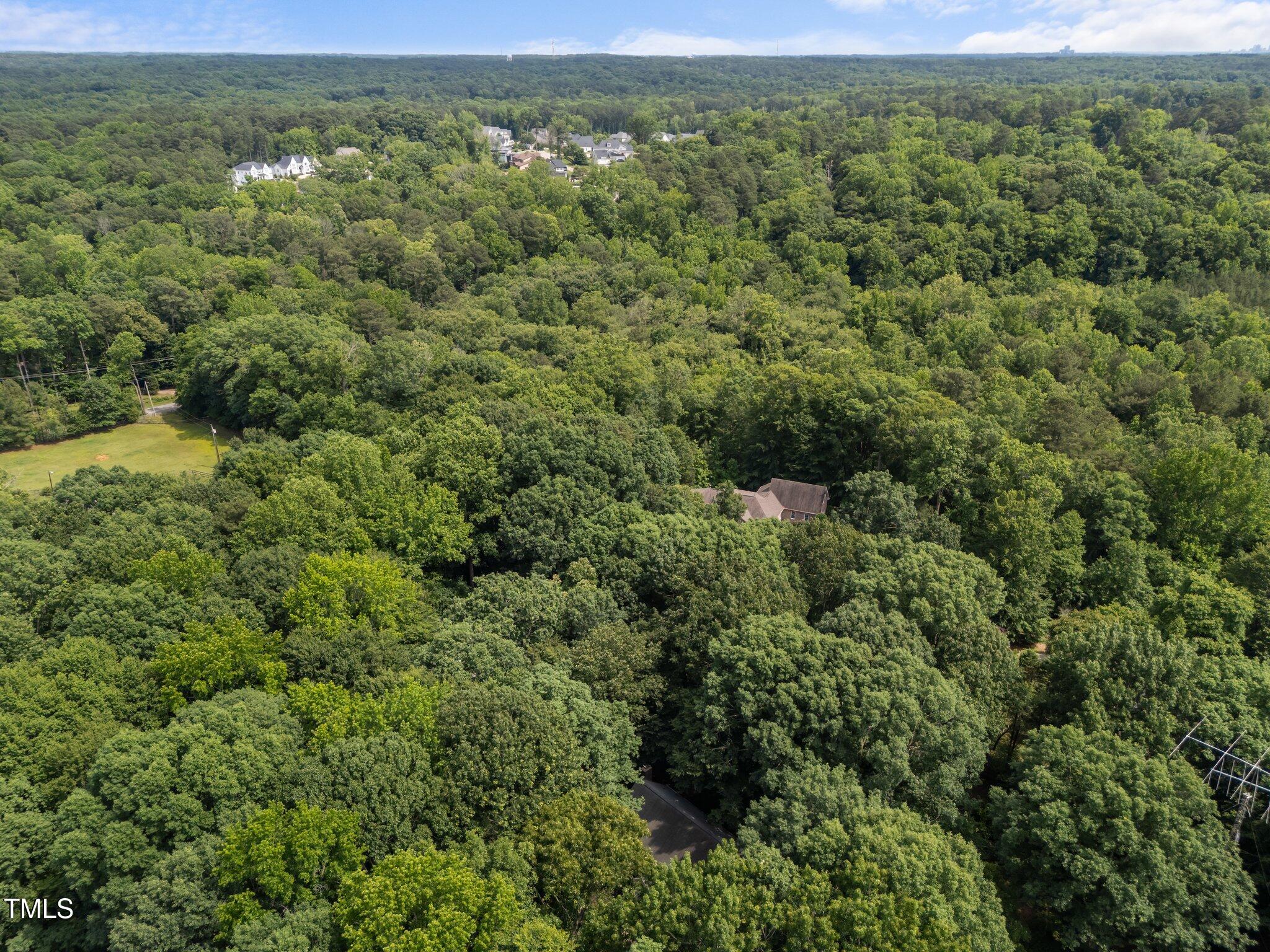 2840 Mattlyn Court Raleigh, NC 27613 - Photo 38 of 42 44-web-or-mls-DJI_20250520151528_0683_D