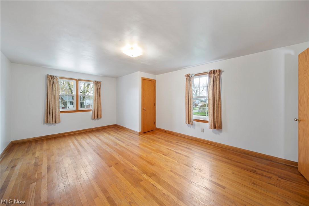 6835 Lake Road East Madison, OH 44057 - Photo 11 of 25 2nd floor over the garage - bedroom 3 - 18 x 12 with hardwood flooring.