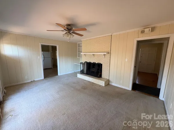 a view of a livingroom with a staircase