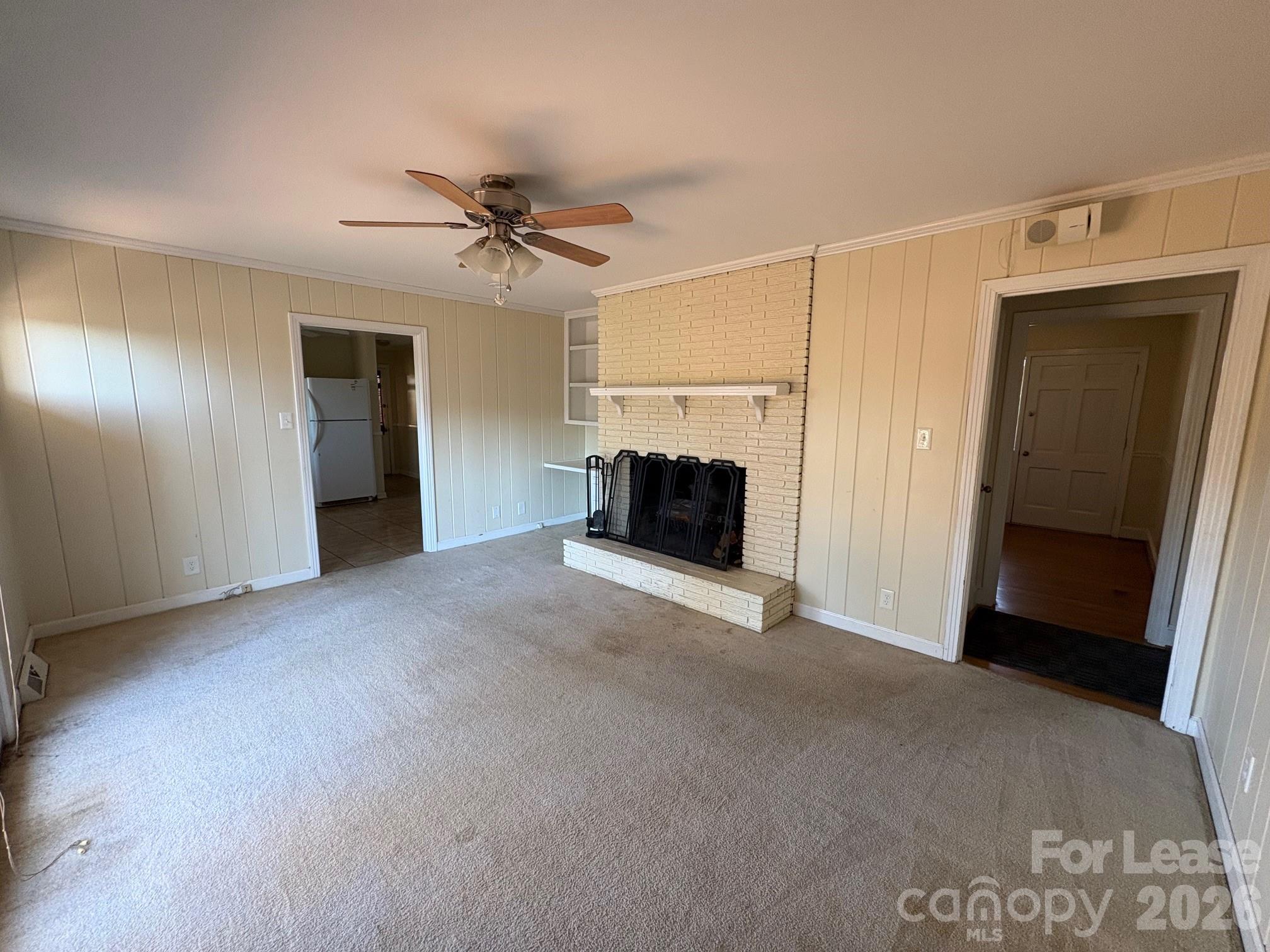 312 Stevens Street Monroe, NC 28112 - Photo 4 of 10 a view of a livingroom with a staircase