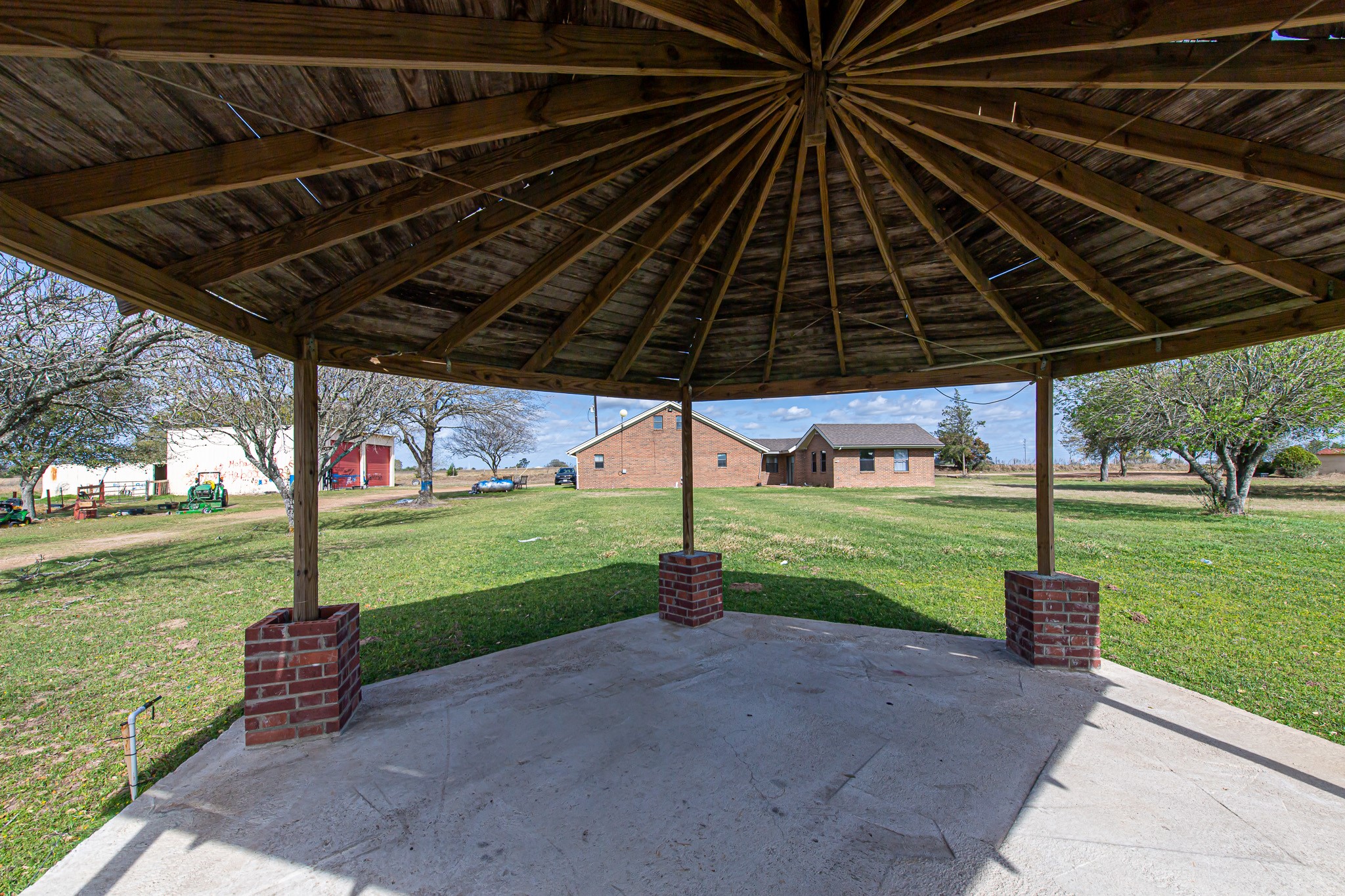 1195 Sens Road Sealy, TX 77474 - Photo 16 of 50 a view of a backyard with wooden floor and fence