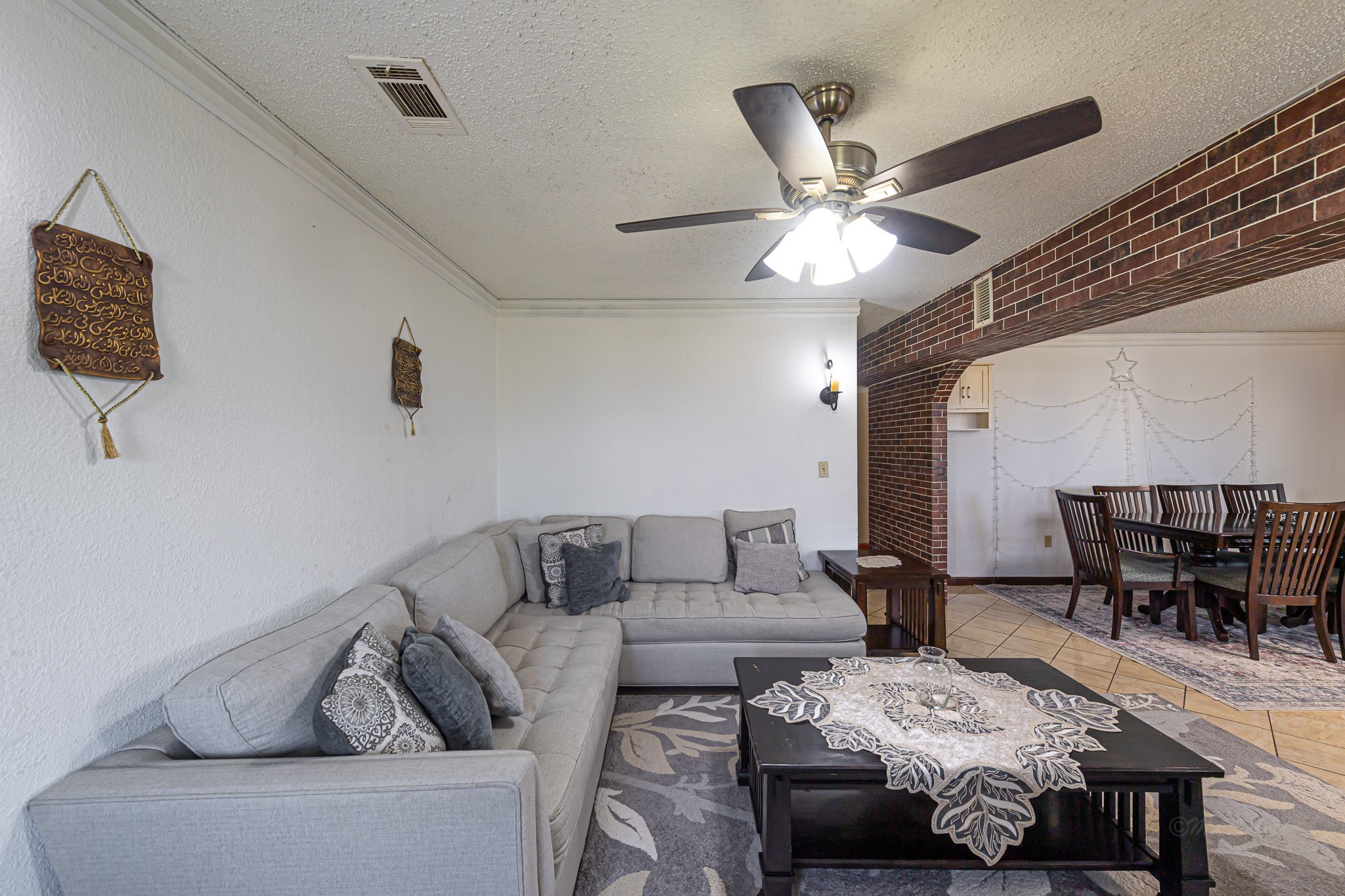 1195 Sens Road Sealy, TX 77474 - Photo 19 of 50 a living room with furniture and a chandelier