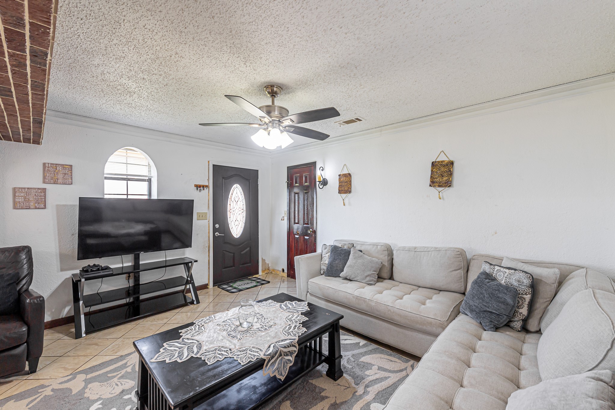 1195 Sens Road Sealy, TX 77474 - Photo 20 of 50 a living room with furniture and a flat screen tv