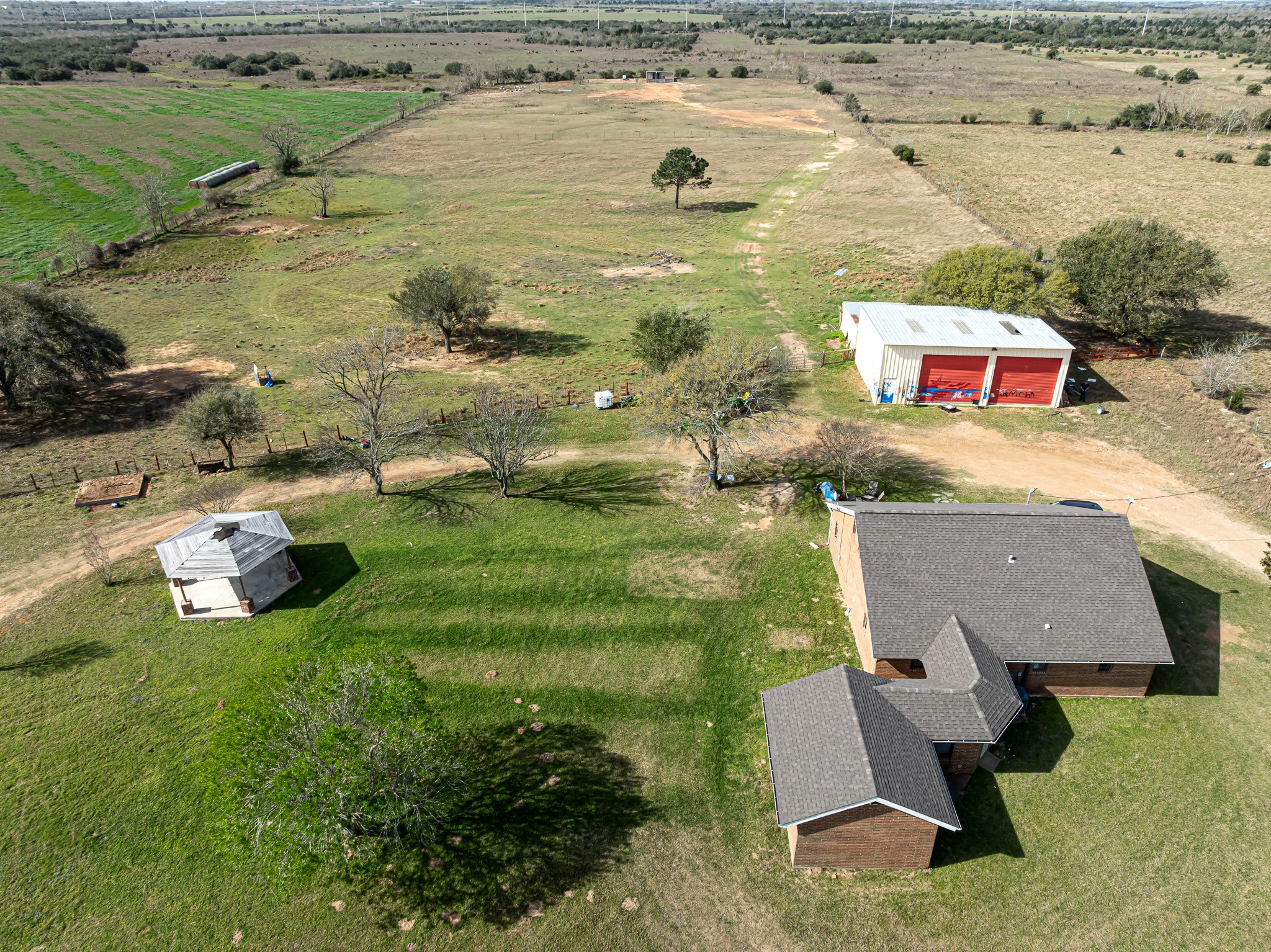 1195 Sens Road Sealy, TX 77474 - Photo 2 of 50 a aerial view of a house with outdoor space