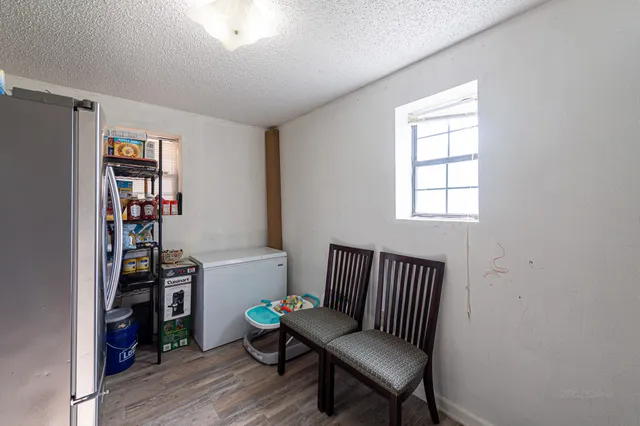 a bathroom with a shower and a toilet