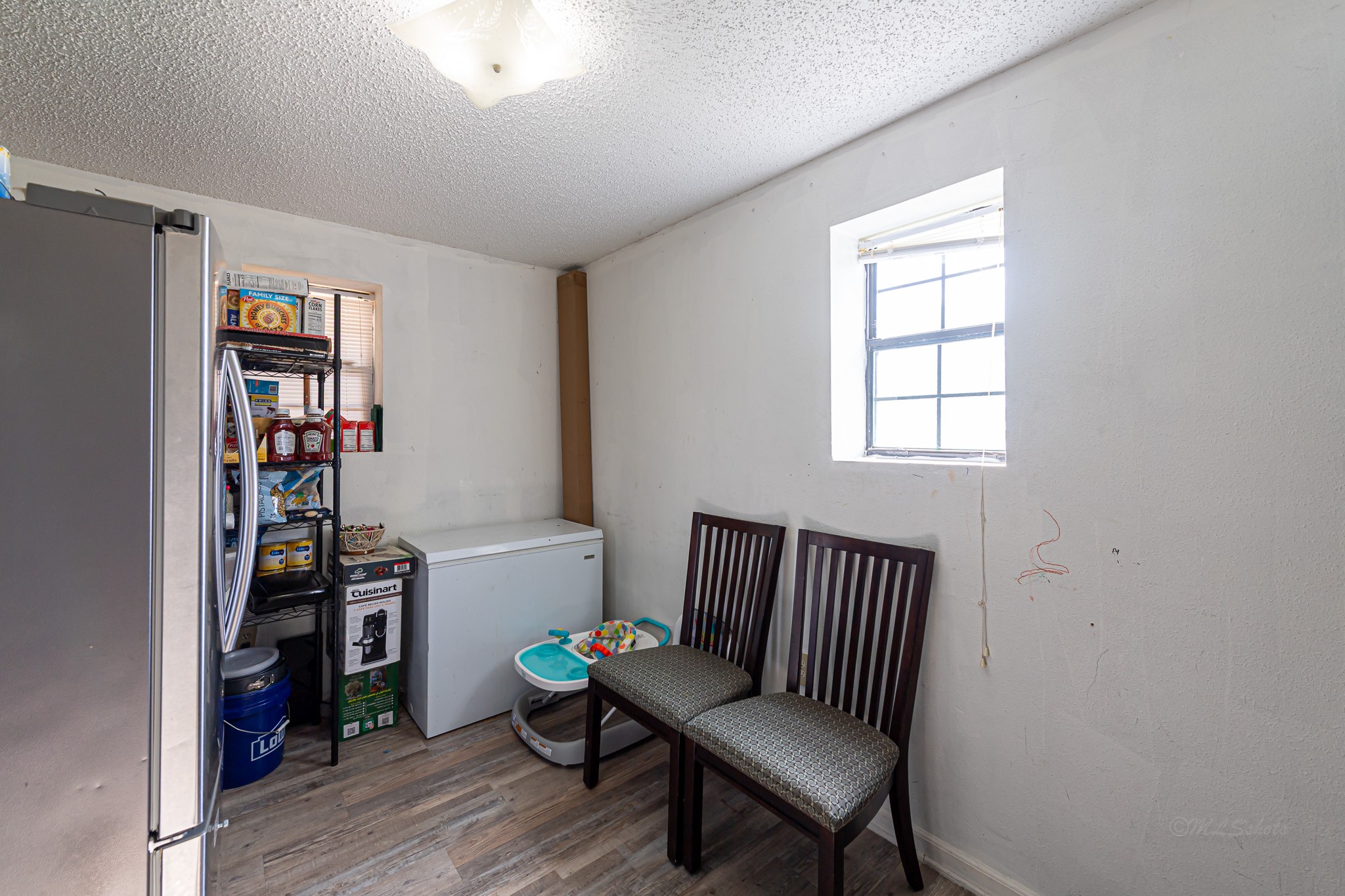 1195 Sens Road Sealy, TX 77474 - Photo 30 of 50 a living room with furniture and a window