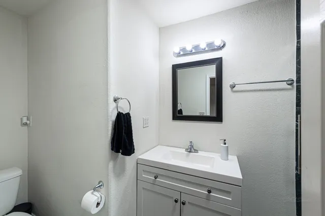 a bedroom with furniture and window