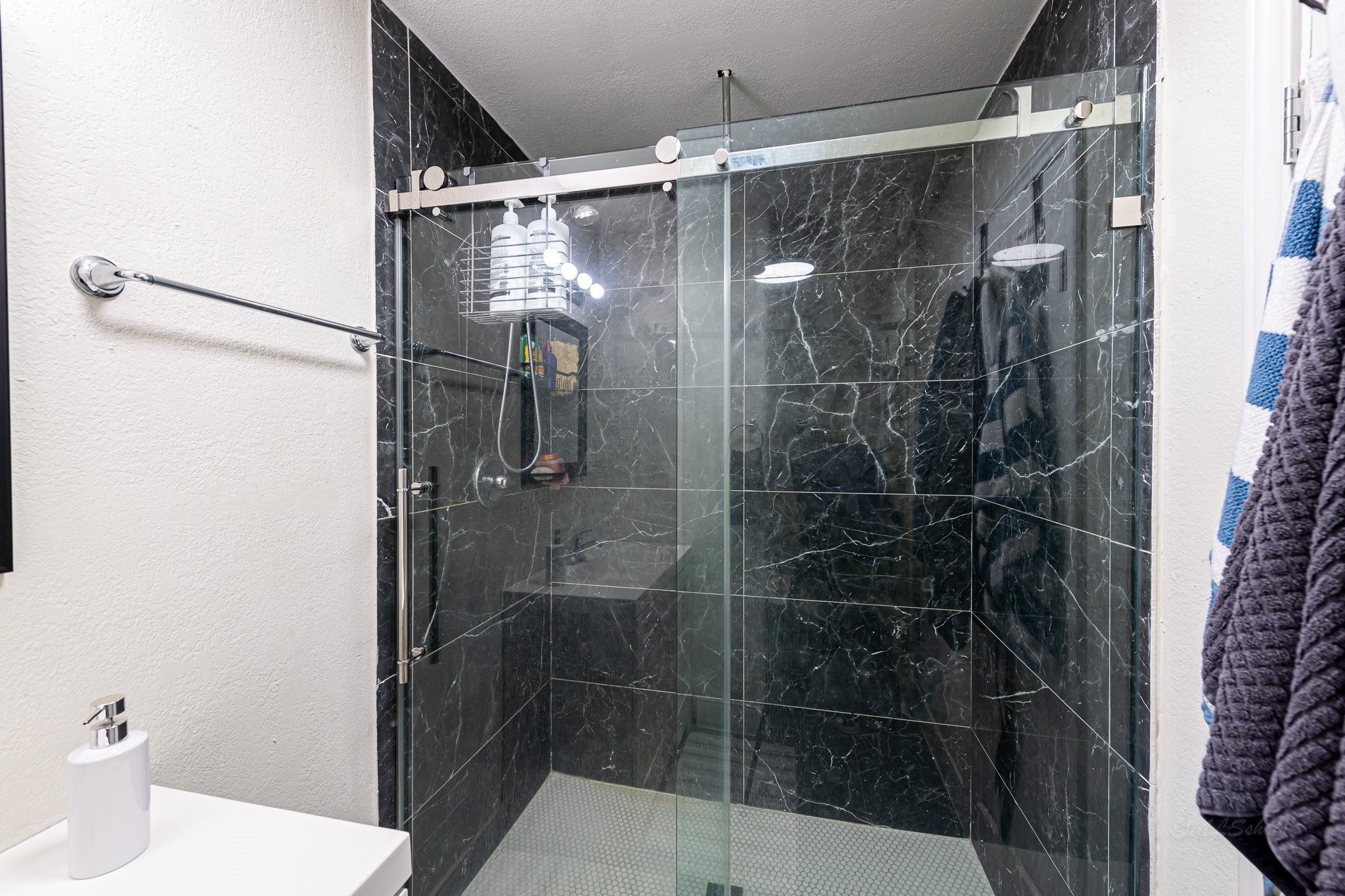 1195 Sens Road Sealy, TX 77474 - Photo 32 of 50 a bathroom with a shower and a toilet