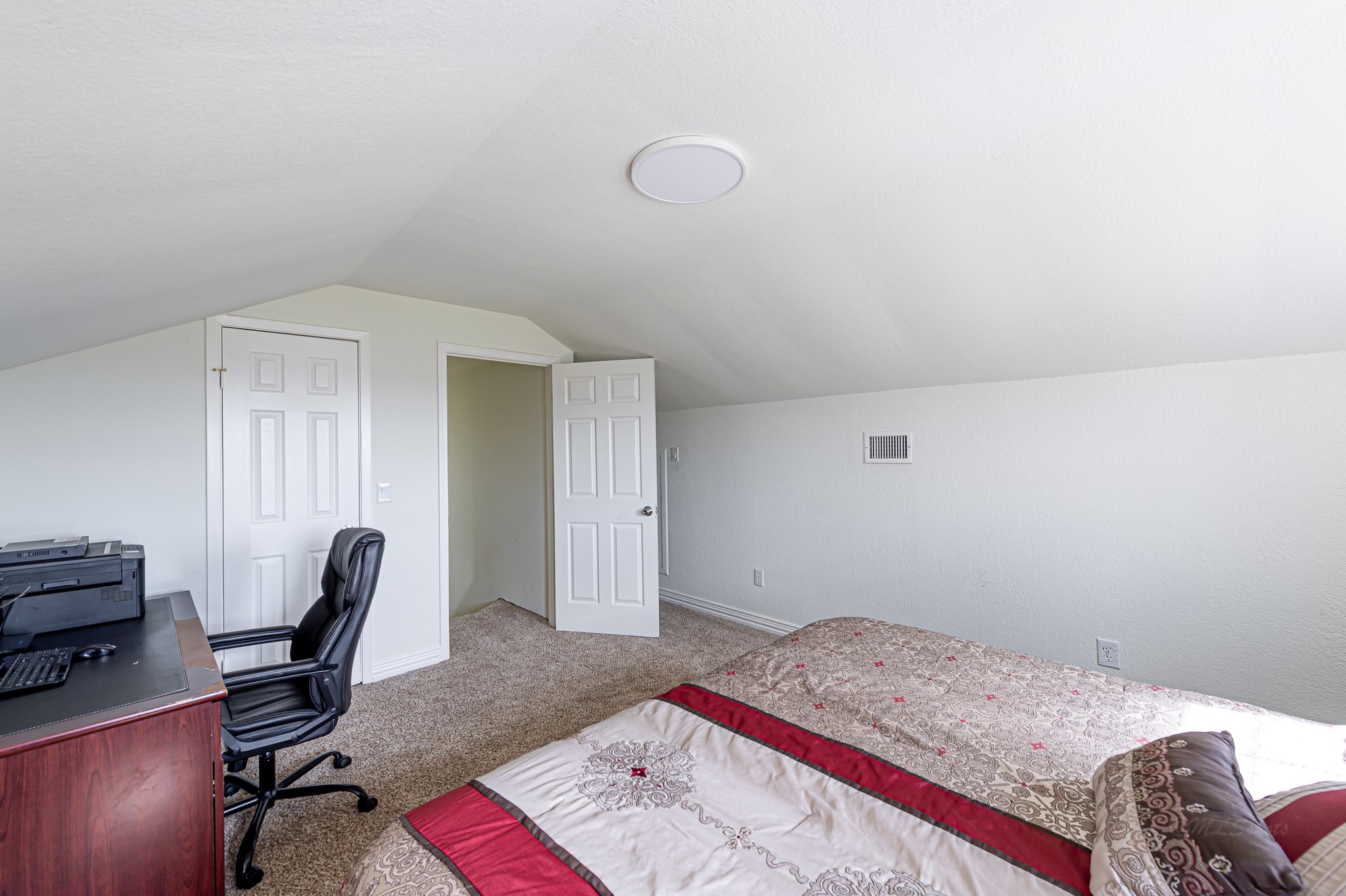 1195 Sens Road Sealy, TX 77474 - Photo 35 of 50 a bedroom with a bed and chair