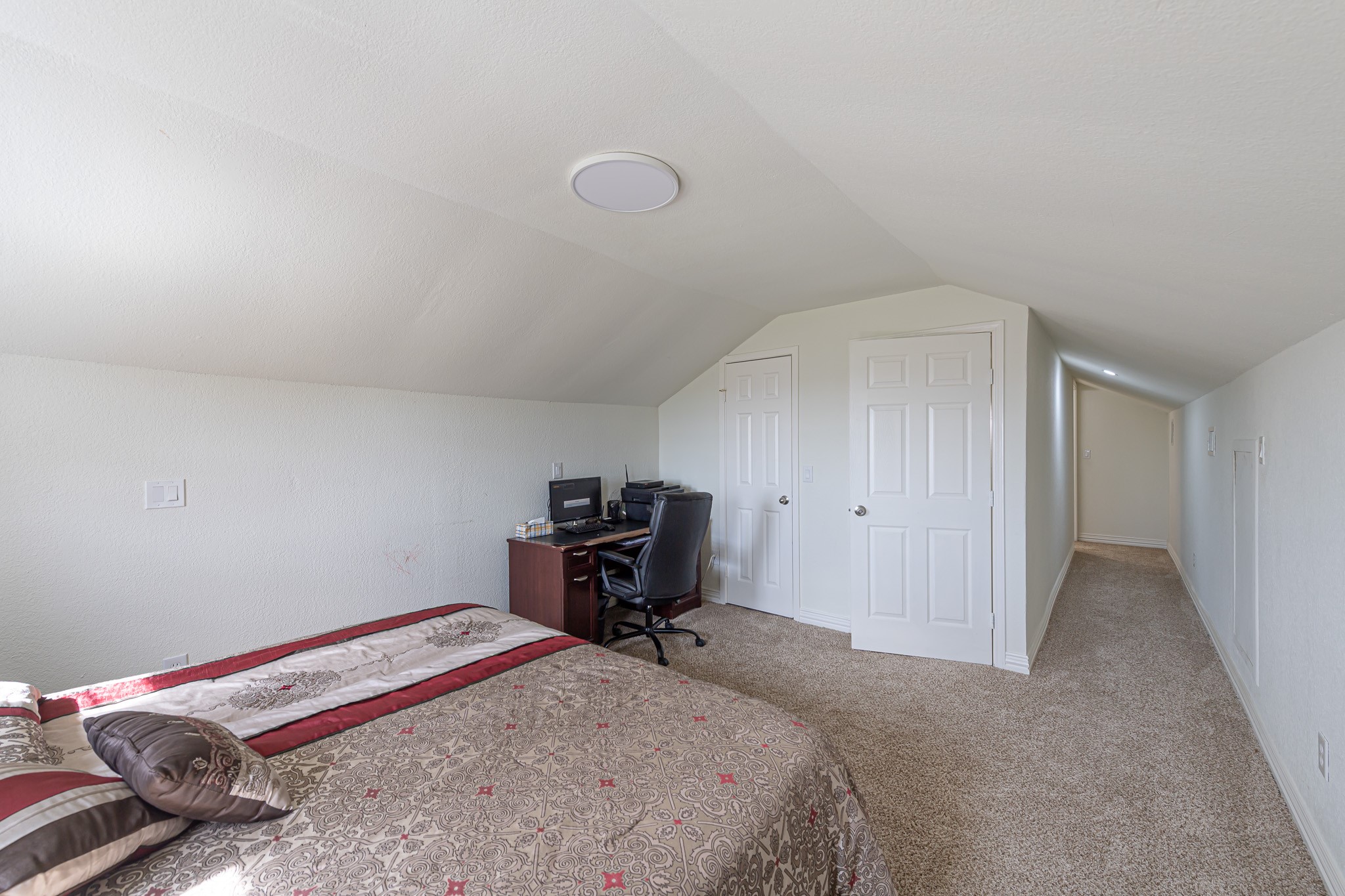 1195 Sens Road Sealy, TX 77474 - Photo 36 of 50 a bedroom with a bed and a chair