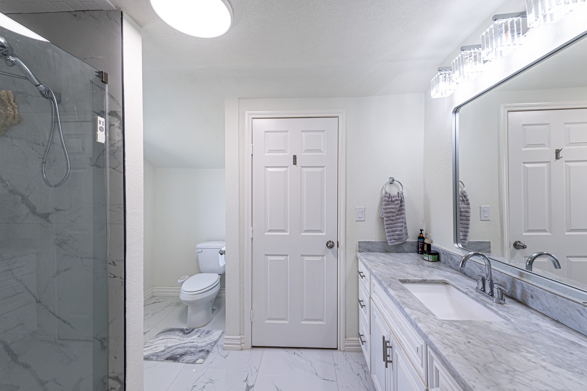 1195 Sens Road Sealy, TX 77474 - Photo 39 of 50 a bathroom with a granite countertop sink toilet and shower