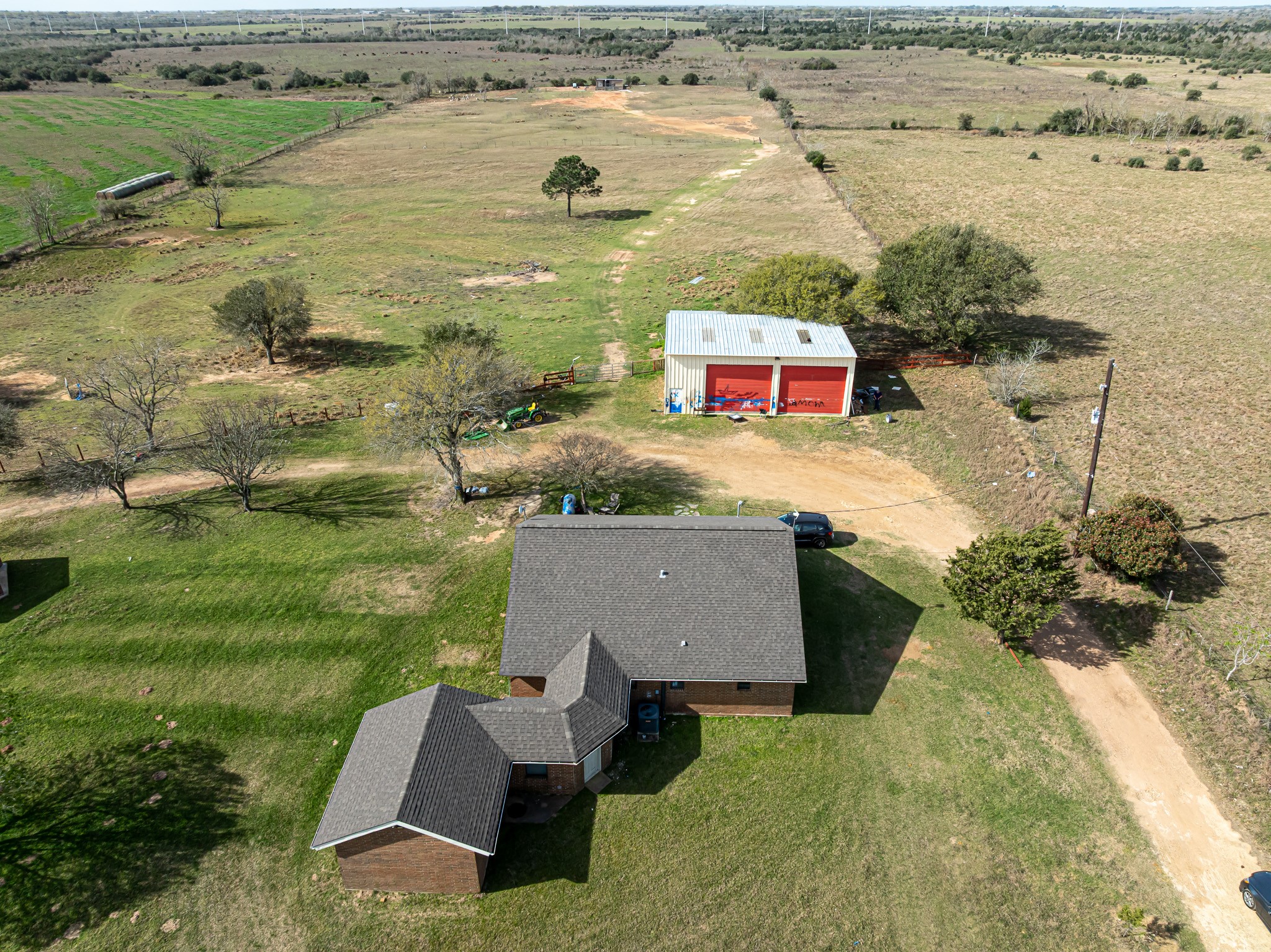 1195 Sens Road Sealy, TX 77474 - Photo 45 of 50 an aerial view of residential houses with outdoor space