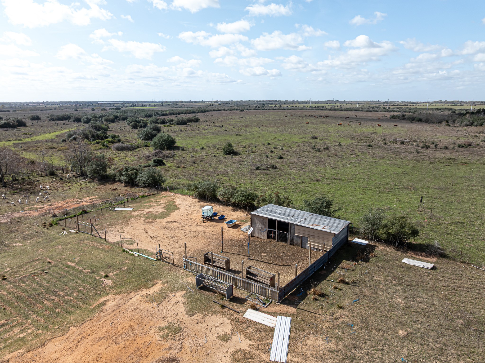 1195 Sens Road Sealy, TX 77474 - Photo 46 of 50 an aerial view of a yard with table and chairs