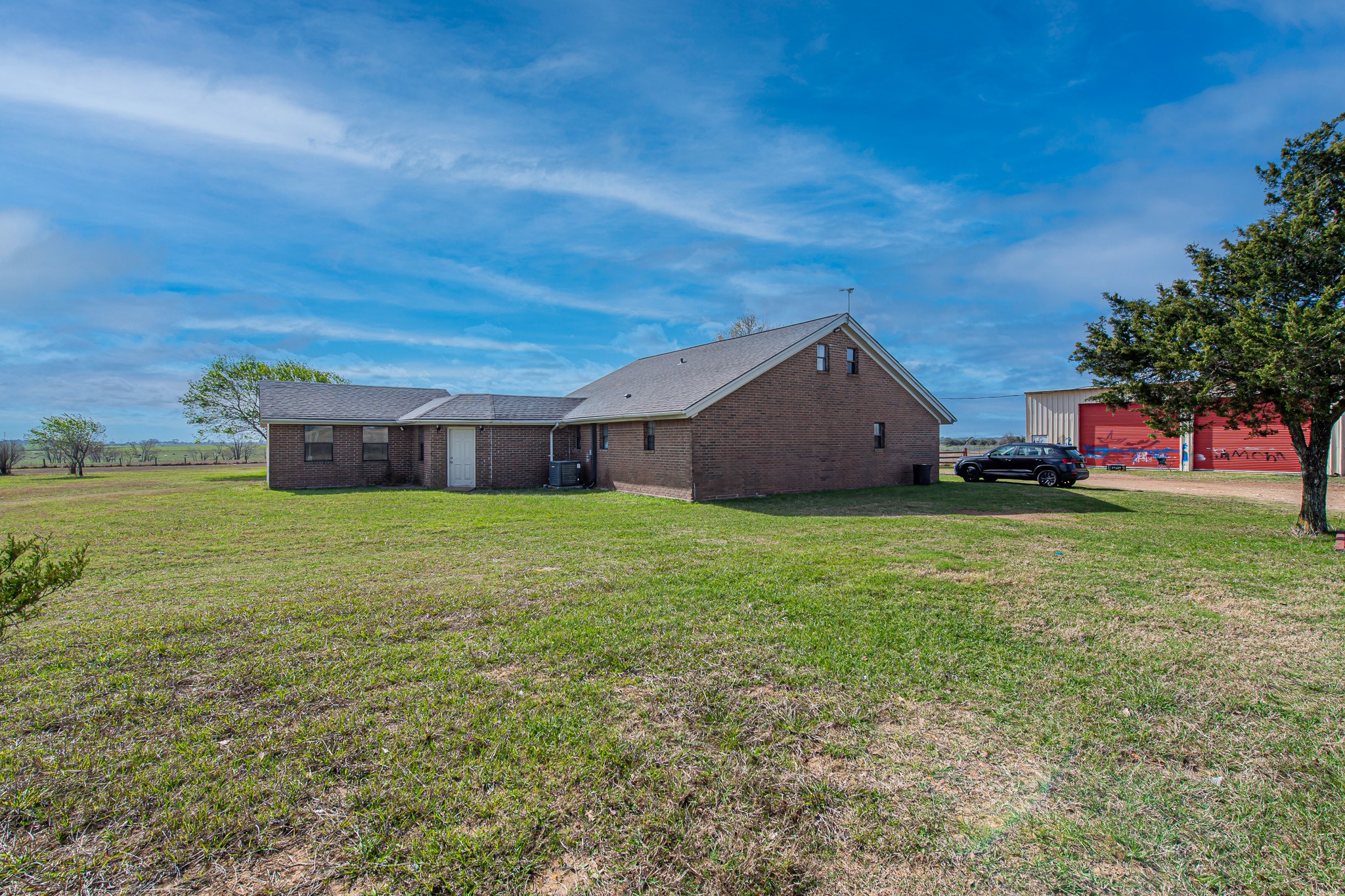 1195 Sens Road Sealy, TX 77474 - Photo 7 of 50 a house view with a garden space