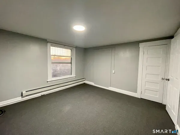 an empty room with a door