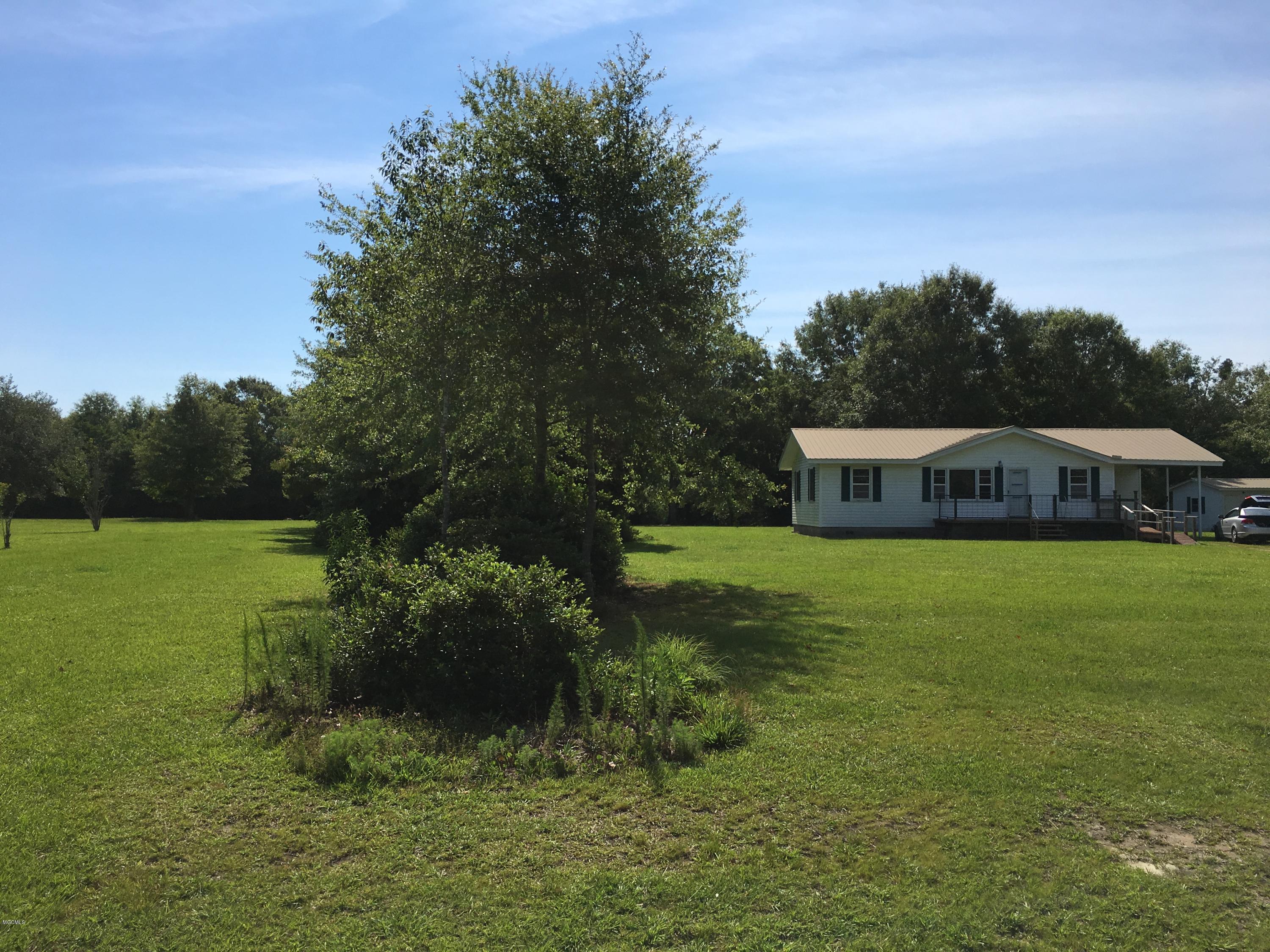 15576 Three Rivers Road Biloxi, MS 39532 - Photo 36 of 38 View of home & vacant lot