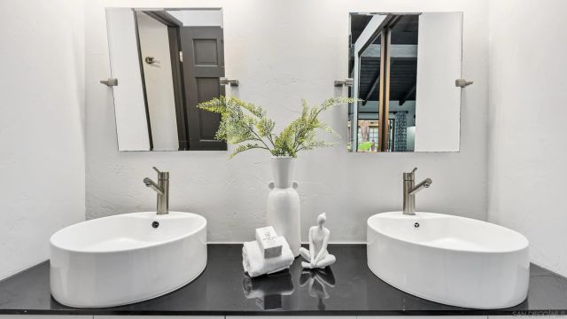a view of a dining room with furniture and window
