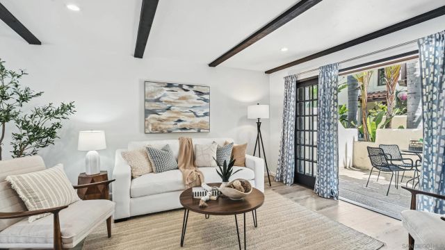 a front view of a house with barbeque oven and kitchen view