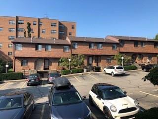 a swimming pool view with a outdoor seating