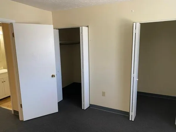 an empty room with closet