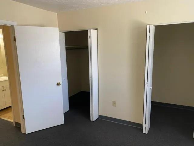 an empty room with closet