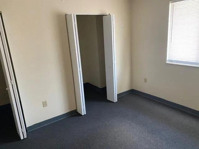 an empty room with a door