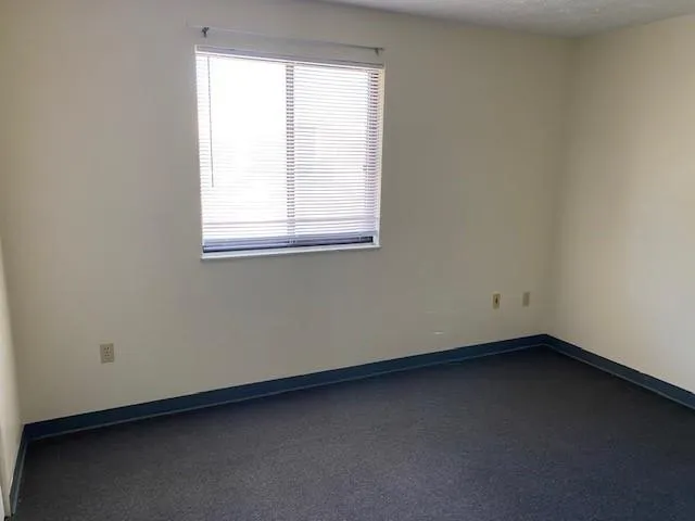 an empty room with closet